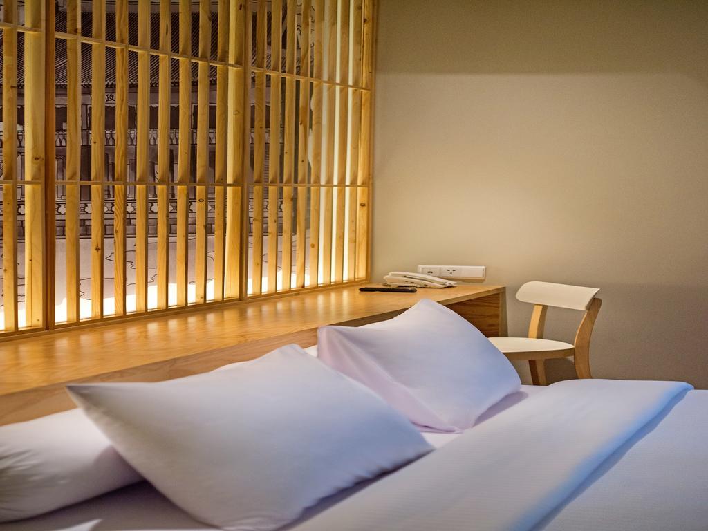 Tama Boutique Hotel Bandung Kültér fotó